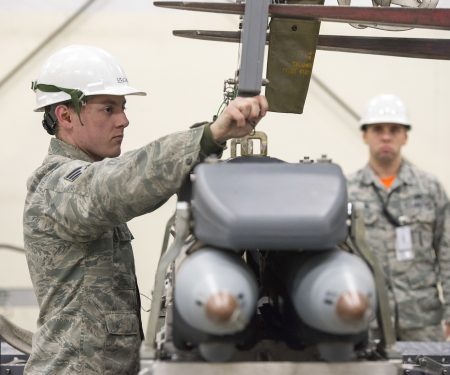3rd Munitions Squadron Airmen practice handling small diameter bombs
