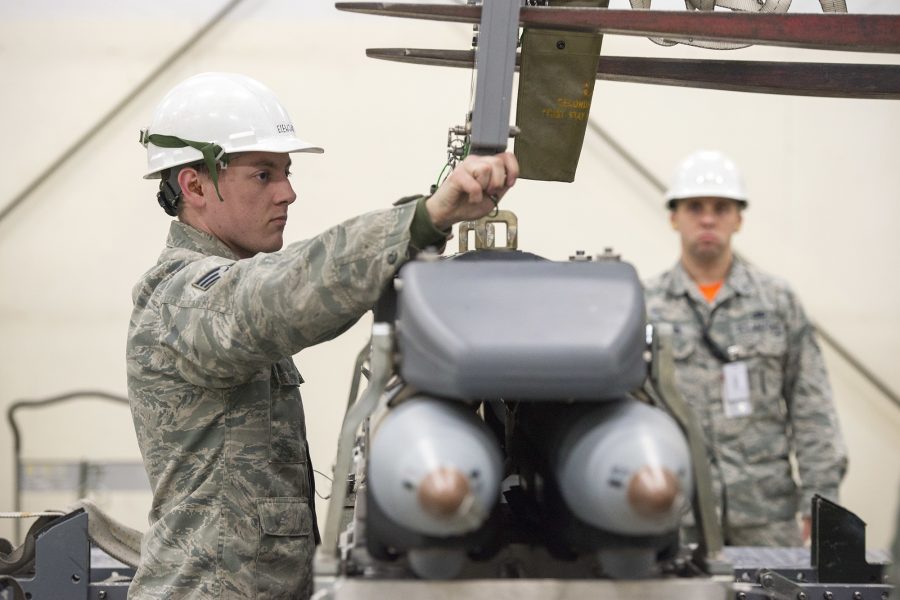 3rd Munitions Squadron Airmen practice handling small diameter bombs