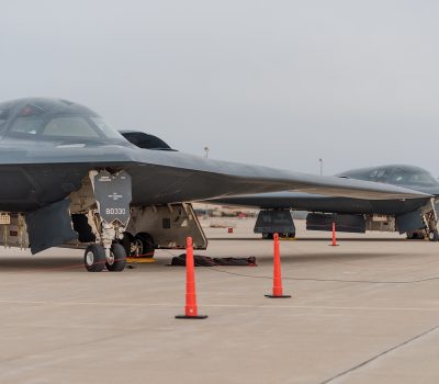 Two B-2 Spirit Stealth Bombers from Whiteman AFB sit on the flight line