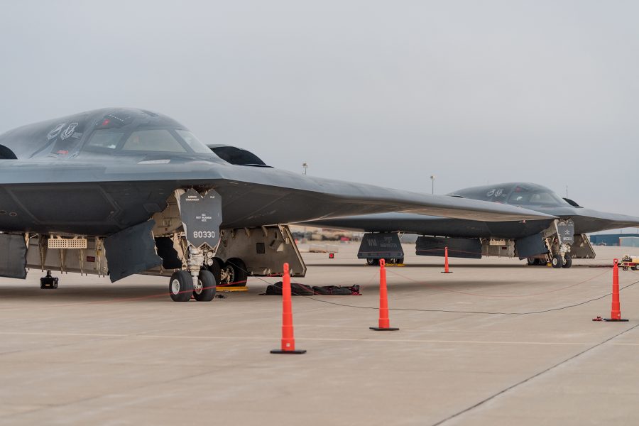 Two B-2 Spirit Stealth Bombers from Whiteman AFB sit on the flight line