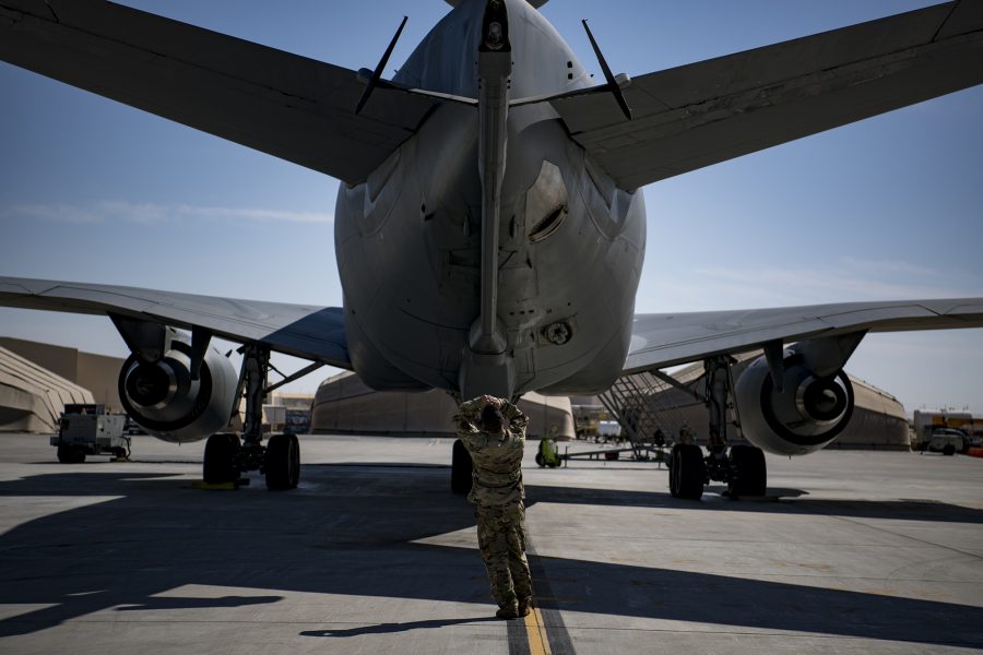 Deployed KC-10 refuels F-15 Strike Eagles