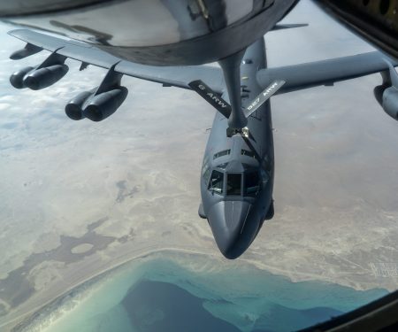 B-52 Stratofortress and F-16 Fighting Falcon fly over U.S. Central Command