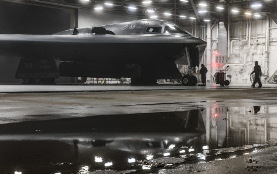 A B-2 Spirit Stealth and 393rd Aircraft Maintenance Squadron crew chiefs prepares for a training sortie