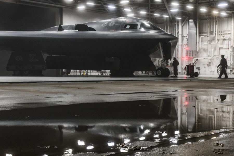 A B-2 Spirit Stealth and 393rd Aircraft Maintenance Squadron crew chiefs prepares for a training sortie