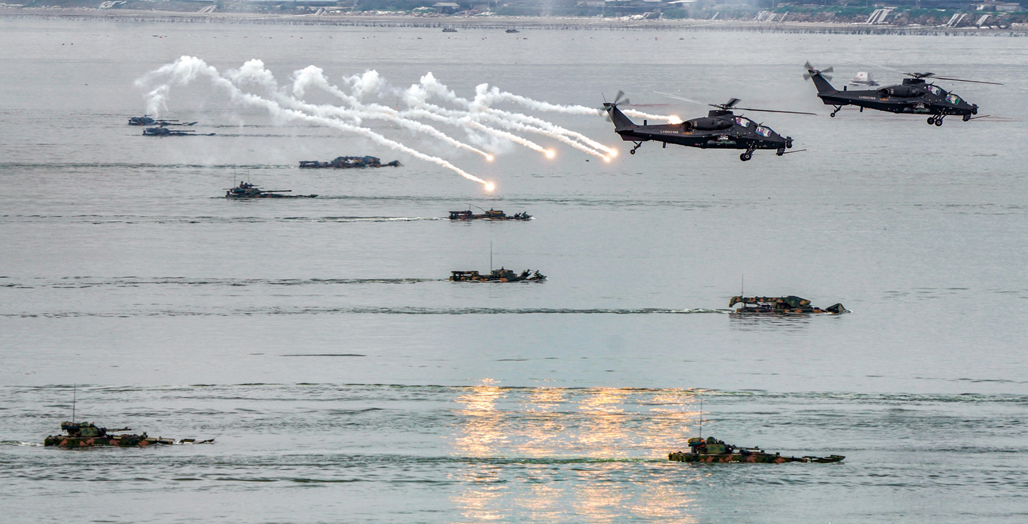 Army helicopters coordinate with naval landing ships in joint training -  China Military