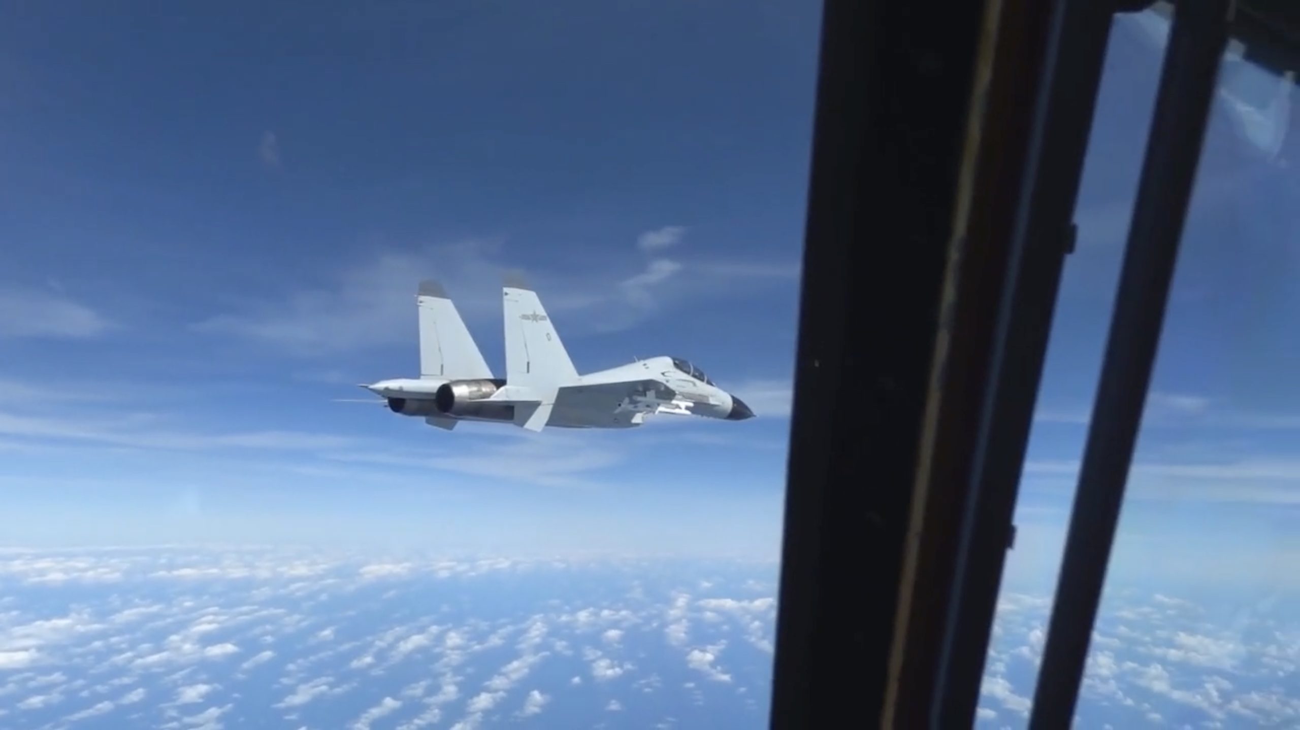 RC 135 Takes Evasive Maneuvers After Unsafe Chinese Fighter Intercept 