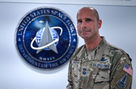 Chief Master Sgt. John F. Bentivegna stands in front of the U.S. Space Force Hallway after receiving news on his selection as the next Chief Master Sergeant of the Space Force, Pentagon, Arlington, Va., May 5, 2023.