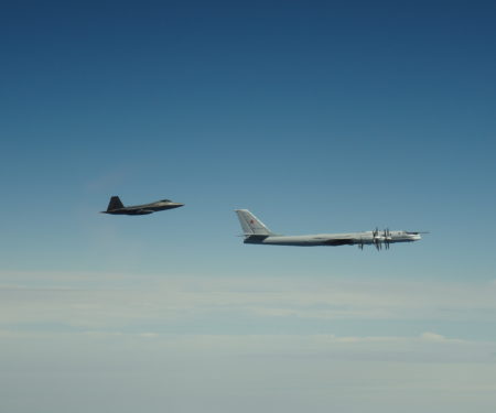 An F-22 Raptor assigned to Joint Base Elmendorf-Richardson, Alaska intercepts a Russian Tu-95 Bear on June 9, 2020. NORAD