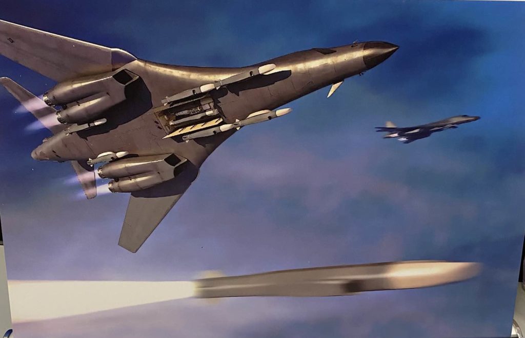 A artist’s rendering shows a B-1 bomber with Boeing’s Load Adaptable Modular Pylon.