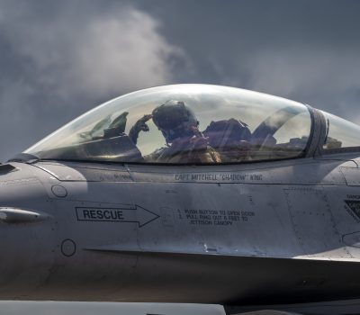 A U.S. Air Force F-16 Fighting Falcon pilot with the 55th Fighter Squadron, Shaw Air Force Base, South Carolina, poses for a photo during Weapons System Evaluation Program-East 23.08 at Tyndall AFB, Florida, May 17, 2023.