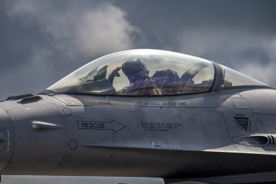 A U.S. Air Force F-16 Fighting Falcon pilot with the 55th Fighter Squadron, Shaw Air Force Base, South Carolina, poses for a photo during Weapons System Evaluation Program-East 23.08 at Tyndall AFB, Florida, May 17, 2023.