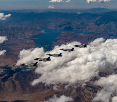 Edwards F-35 Integrated Test Flight test pilots fly a Technical Refresh 3 (TR-3) flight test at Edwards Air Force Base, Calif., in August. Five aircraft, equipped with TR-3 hardware and software, flew together, and represented a continuation of the extensive flight test campaign underway. TR-3 provides the computational horsepower to support modernized Block 4 capabilities and ensure the F-35 remains superior to adversaries for decades to come. (Photo courtesy of Lockheed Martin/Darin Russell)