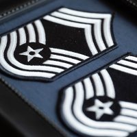 Two senior non-commissioned officers are promoted to the rank of chief master sergeant during a ceremony at Hulman Field Air National Guard Base in Terre Haute, Ind., June 3, 2023.
