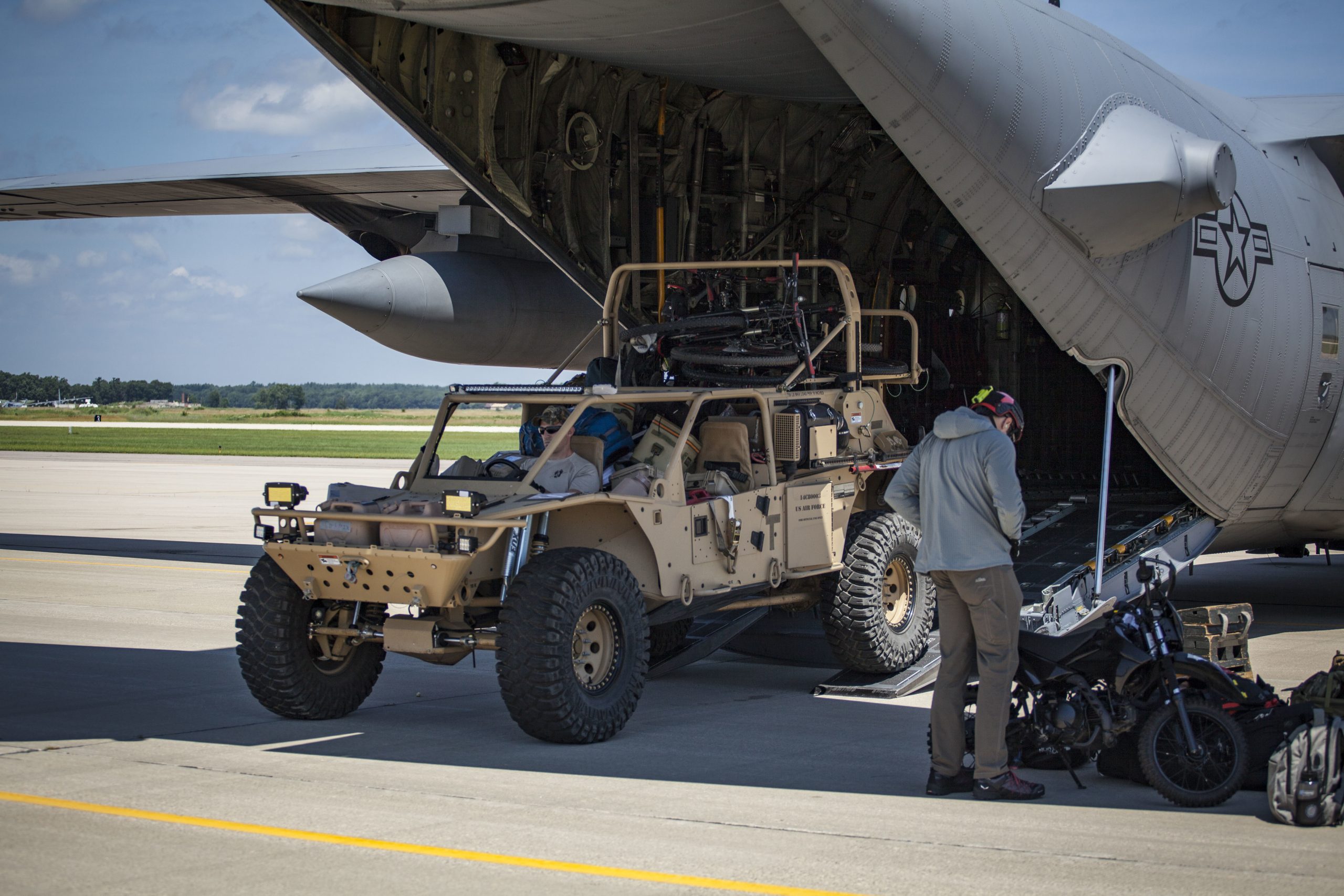 Tactical Vehicle Rollover on WWII-Era Road Leaves 2 Airmen Disabled