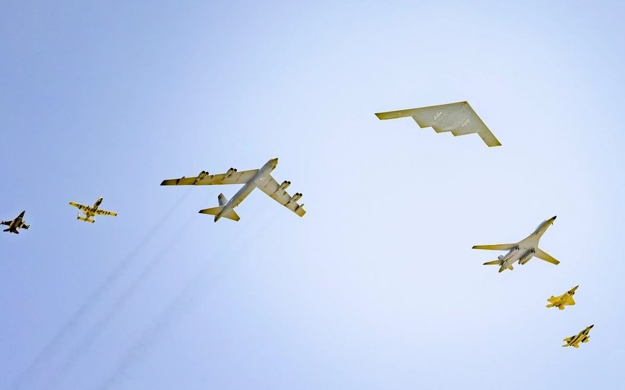 Bombers, Fighters Unite in Rare 7-Plane Flyover