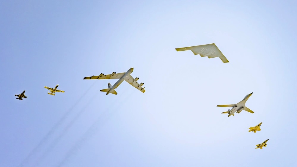 Bombers, Fighters Unite in Rare 7-Plane Flyover
