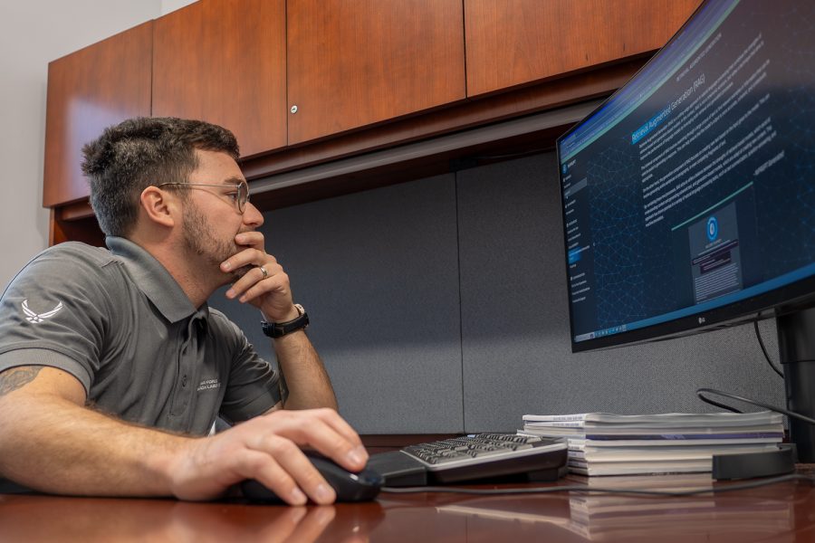 Air Force Research Laboratory Public Affairs Specialist Kenneth McNulty conducts background research for a project using NIPRGPT, a large language model generative artificial intelligence tool developed by AFRL in conjunction with other DAF partners. Photo by Keith C Lewis, courtesy AFRL 