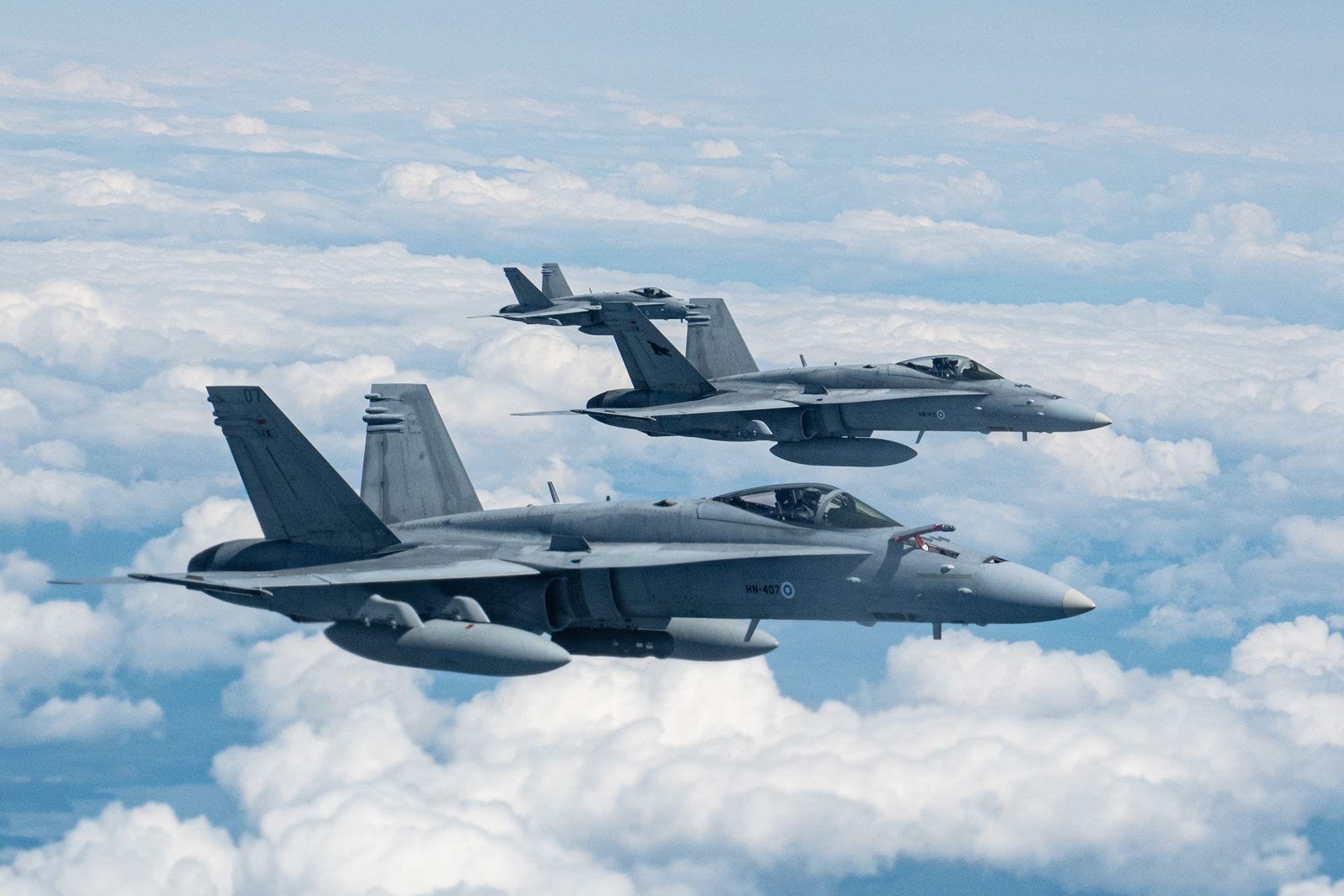 Three Finnish Air Force F/A-18 Hornets seen from a U.S. Air Force KC-135 during Atlantic Trident 25.