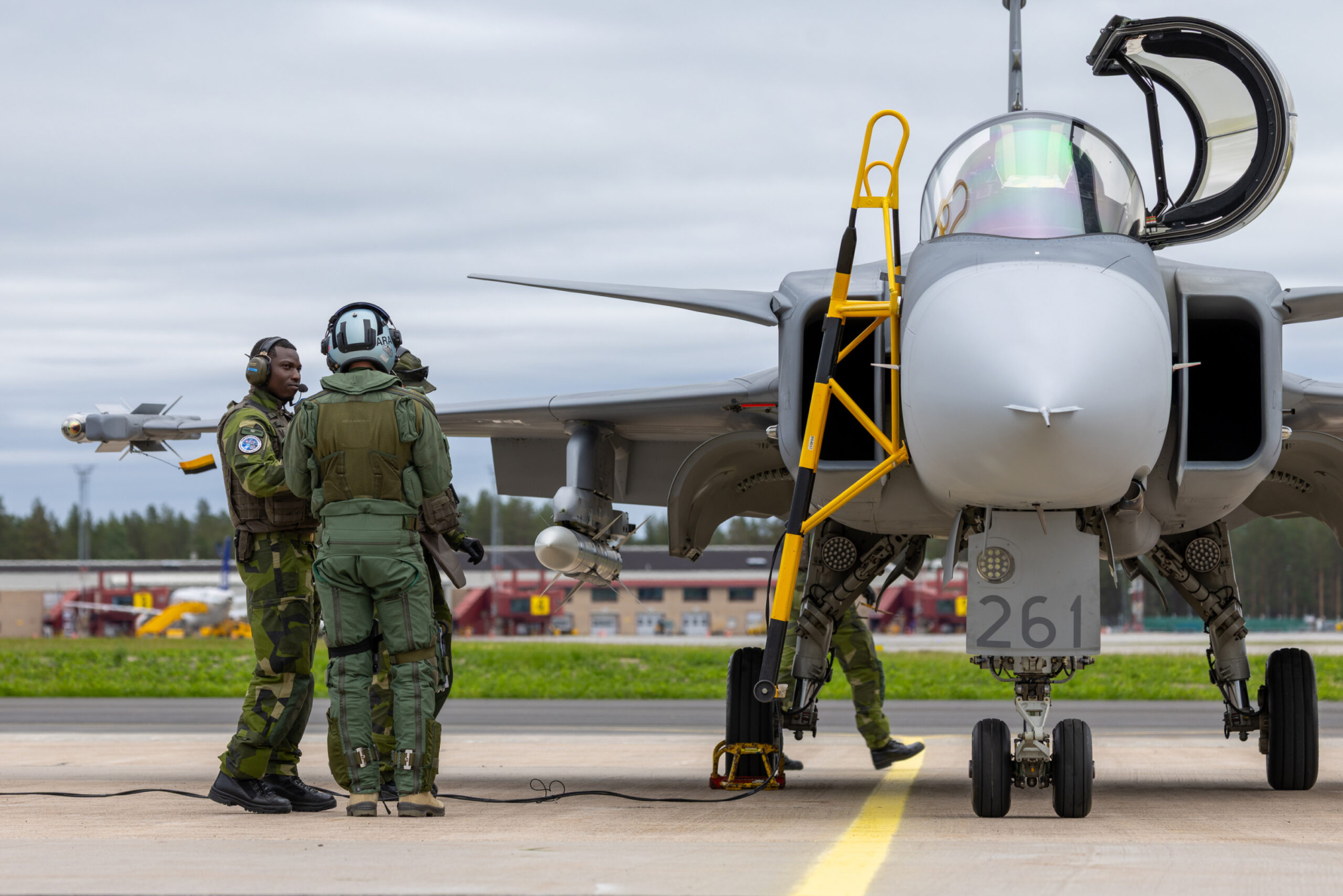 Swedish Air Force personnel prepare a Gripen fighter at Lulea Air Base, Sweden, during Ramstein Flag.
