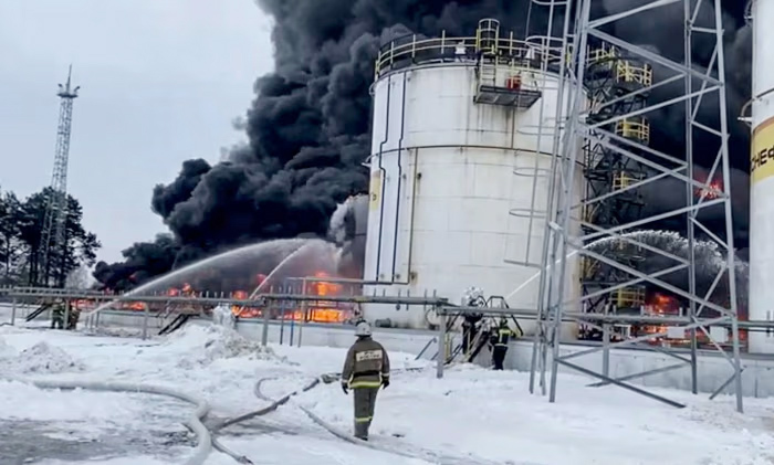 Emergency firefighters battle a blaze at a Russian oil depot near Bryansk following a Ukrainian drone strike.